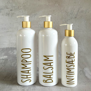 250 ml shampooflaske med guldkant og label